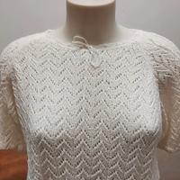 maglia traforata, bianca, a maglia. taglia M/L