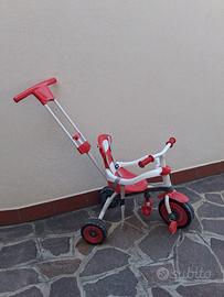 Triciclo a pedali e a spinta