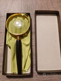 Lente di ingrandimento vintage in ottone