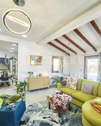 Attico ristrutturato con finiture di qualità