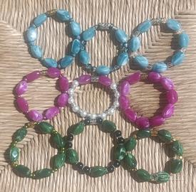 Bracciali elastici con perle effetto pietra/marmo 