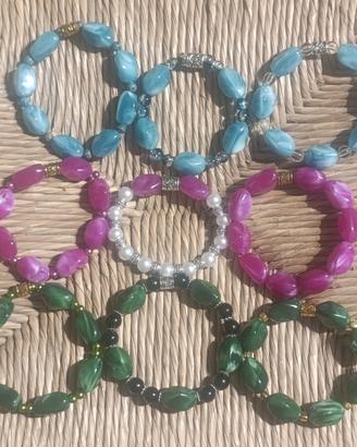 Bracciali elastici con perle effetto pietra/marmo 