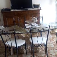 tavolo in vetro con 6 sedie