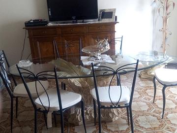 tavolo in vetro con 6 sedie