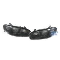 FARI PER OPEL OMEGA 94-99 LENTE A LENTE NERA