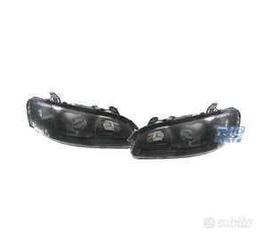 FARI PER OPEL OMEGA 94-99 LENTE A LENTE NERA