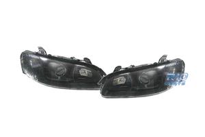 FARI PER OPEL OMEGA 94-99 LENTE A LENTE NERA