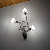 Lampadario a muro con due applique