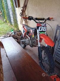 Pit bike 125 4t + stivali acerbi e caschi LS2