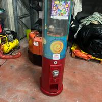 Distributore palline giochi sorprese gadget bimbi