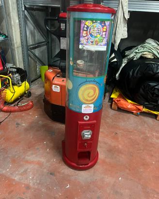 Distributore palline giochi sorprese gadget bimbi