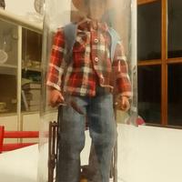 Tex Willer con vestiti in tessuto e accessori