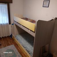 Letto castello con la scala a cassettoni 