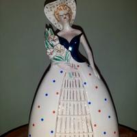 Figura femminile in ceramica dipinta a mano 