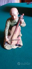 CAPODIMONTE- Statua suonatore di contrabbasso.