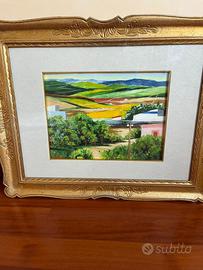 Quadro paesaggistico con cornice dorata