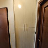 Armadio in legno a 4 ante