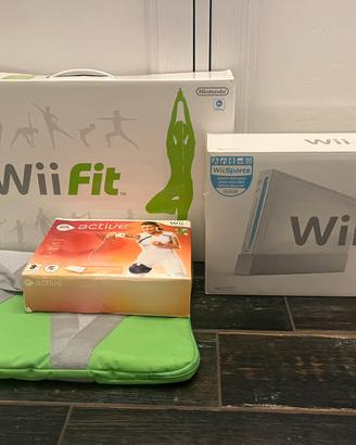 Nintendo Wii + Wii Fit + accessori e giochi