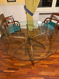Tavolo rotondo in cristallo con base in legno