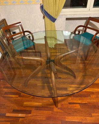 Tavolo rotondo in cristallo con base in legno