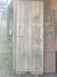 portone in legno massello primi 900