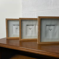 Tre cornici portafotografie in betulla