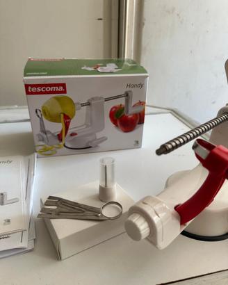 articolo per sbucciare ed affettare frutta manuale