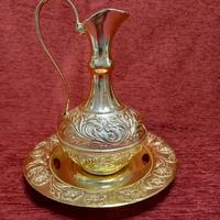 Centro tavola vintage brocca con piatto.