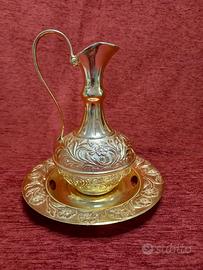 Centro tavola vintage brocca con piatto.