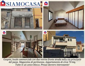 Casa con appartamento, locale commerciale e garage