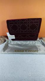 Pochette Anna Cecere in velluto e borchie