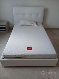 Letto una piazza e mezza con contenitore.
