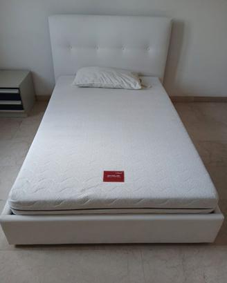 Letto una piazza e mezza con contenitore.