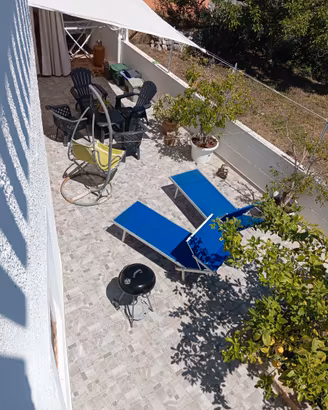 Appartamento con veranda coperta e cortile interni