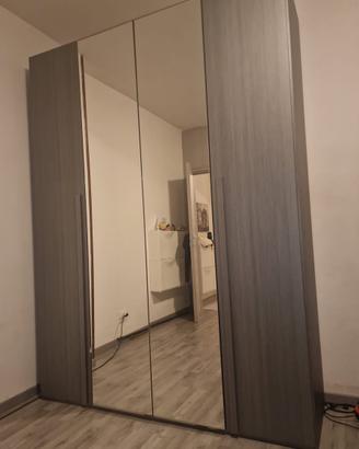 Set camera matrimoniale completo. Armadio 4 ante..