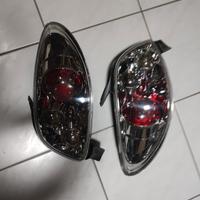 fanali tuning per Peugeot 