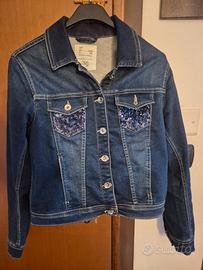 Giubbotto jeans con paillettes blu su tasche. OVS