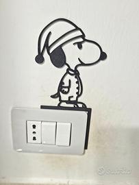 Snoopy che si prepara per dormire 