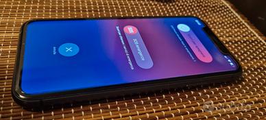 iPhone 11 come nuovo + quad lock