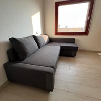 Divano letto angolare e contenitore