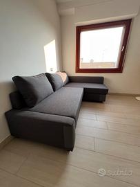 Divano letto angolare e contenitore