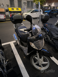 Sh 125 con coperta tucano e moffole