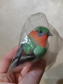 uccello artificiale verde