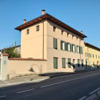 Casa accostata con giardino e soffitta