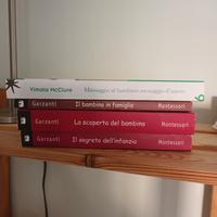 libri del metodo Montessori e massaggio neonatale.