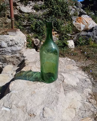 damigiane e bottiglioni in vetro