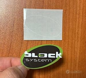 Adesivi block system 