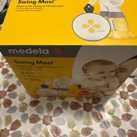 Tiralatte medela swing maxi
