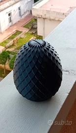 Uovo di dinosauro salvadanaio