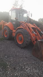 Vendita terna escavatore gommato